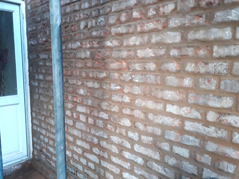 Wall Repair and Brick Replacement